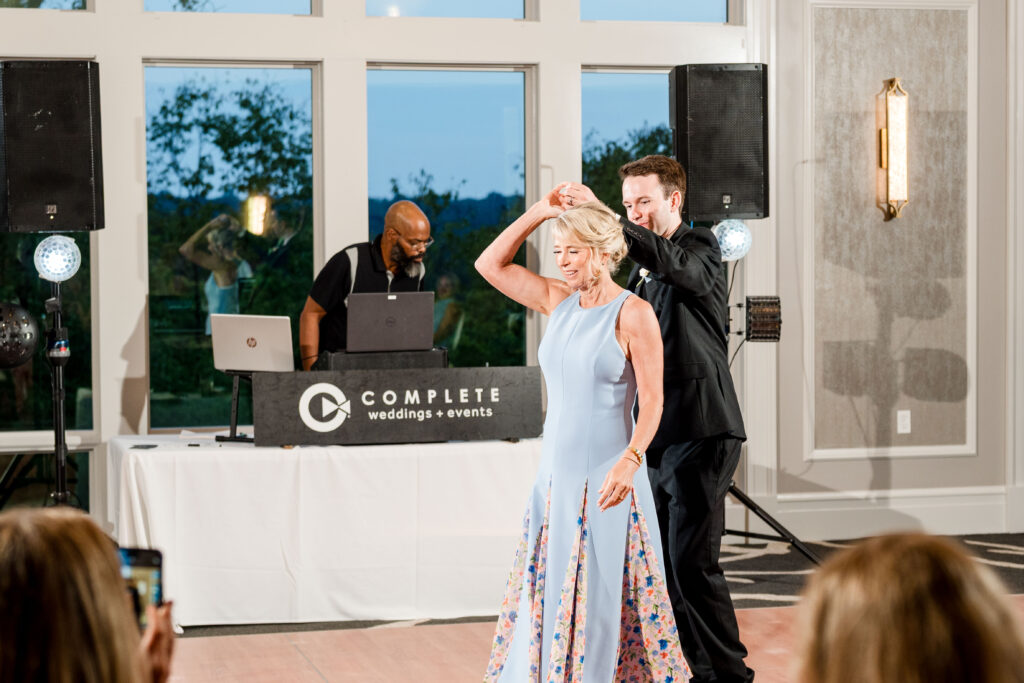 Mother of groom and groom share their mother son dance