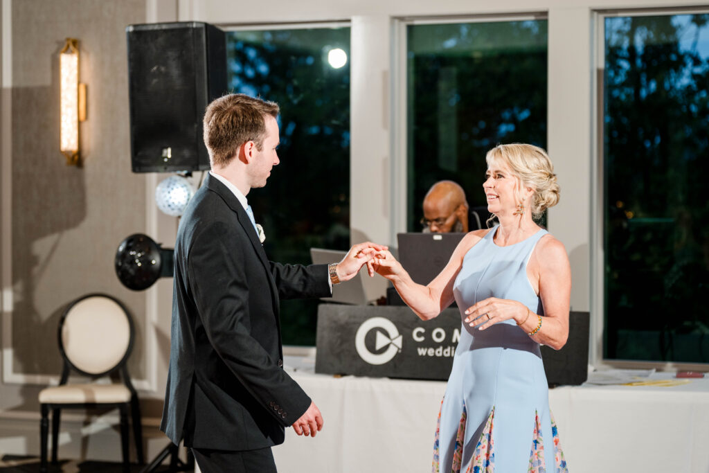 Mother of groom and groom share their mother son dance