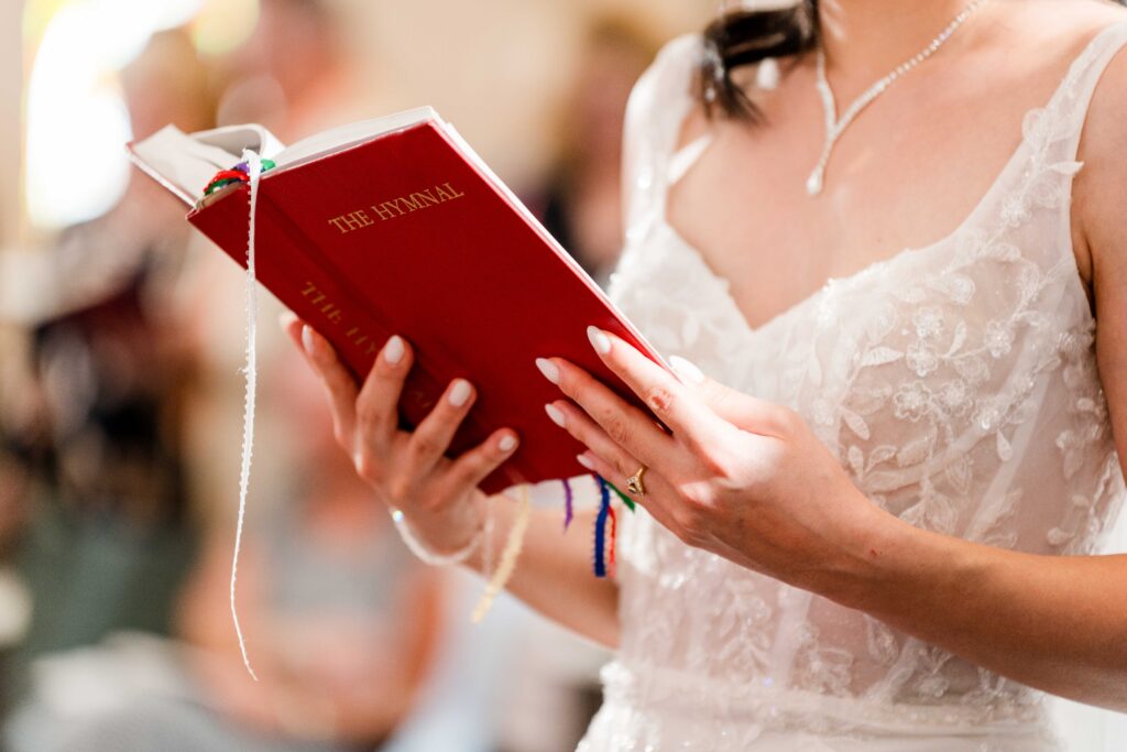 Sertap singing along to the hymns in Grand Rapids Church