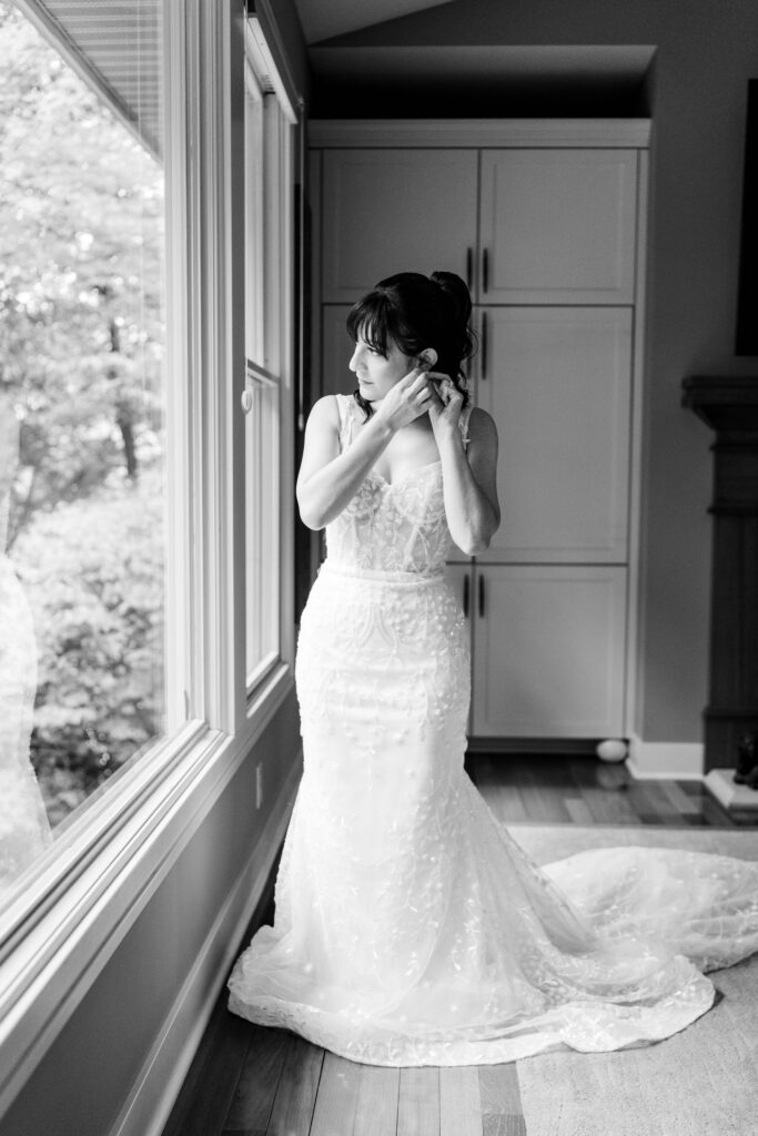 Sertap getting ready upstairs with bridal party at Grand Rapids Home
