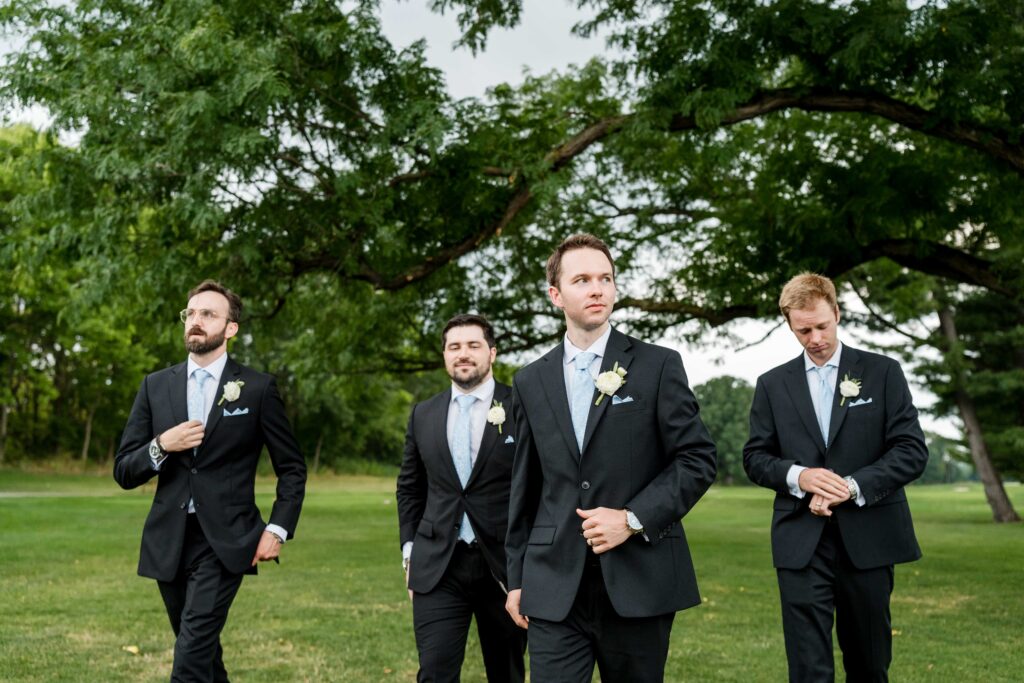Max and his groomsmen pose for bridal party photos at Blythefield