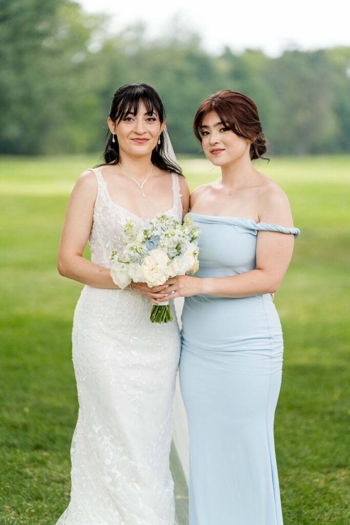 Sertap with her bridesmaid for a portrait