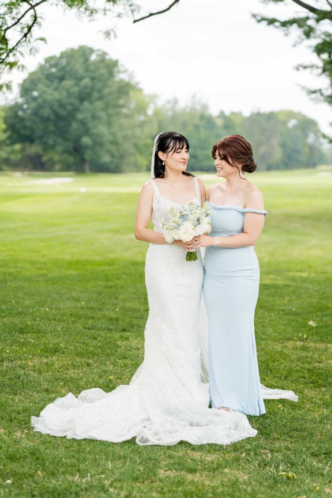 Sertap with her bridesmaid for a portrait