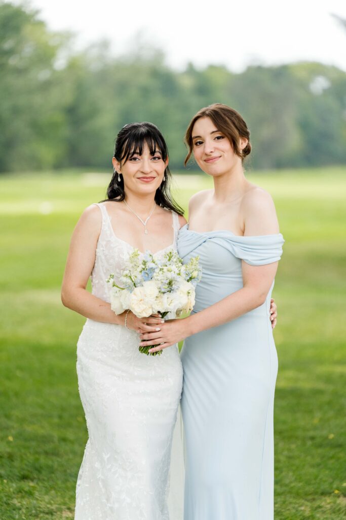 Sertap with her bridesmaid for a portrait