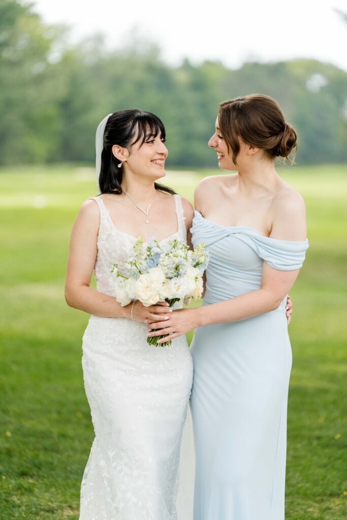 Sertap with her bridesmaid for a portrait