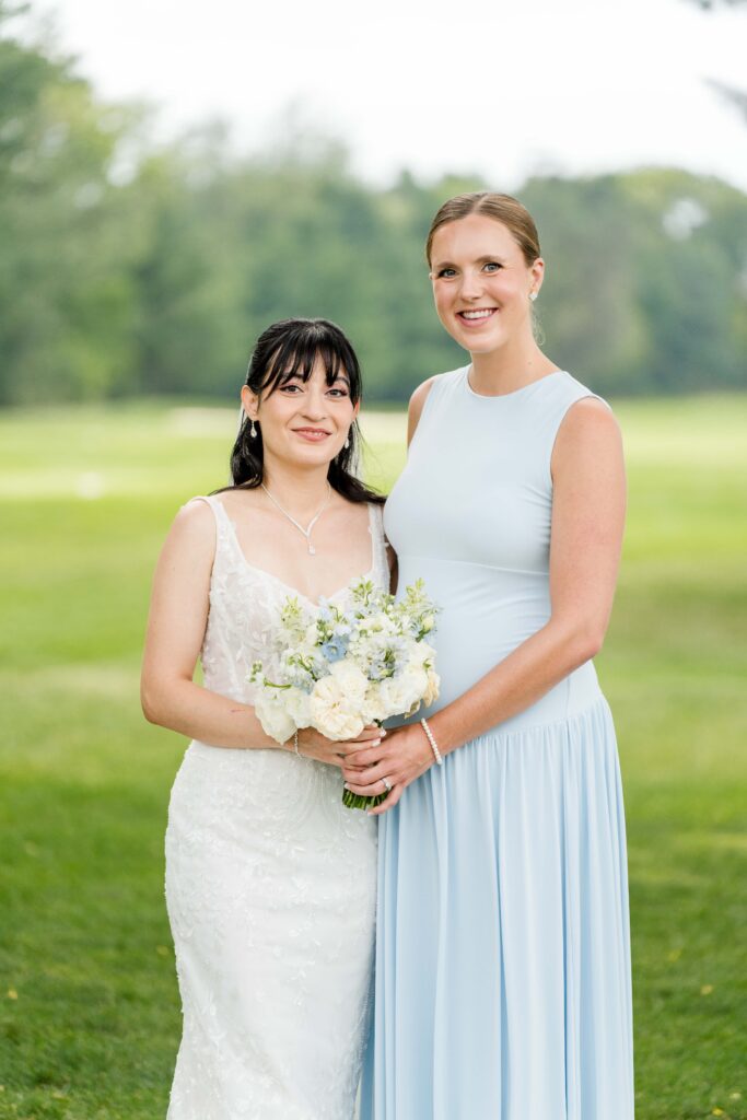 Sertap with her bridesmaid for a portrait