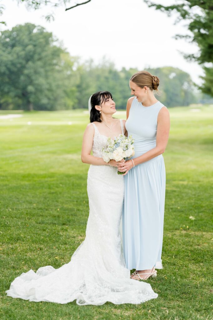 Sertap with her bridesmaid for a portrait