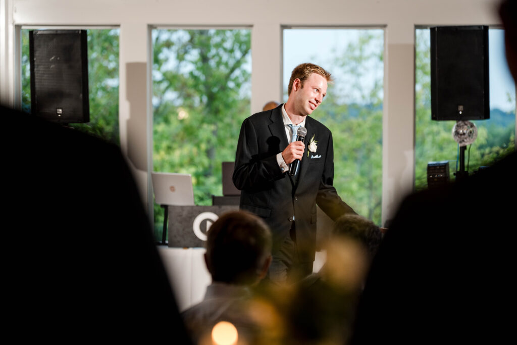 Max's brother gives the best man speech on the dance floor in Grand Rapids